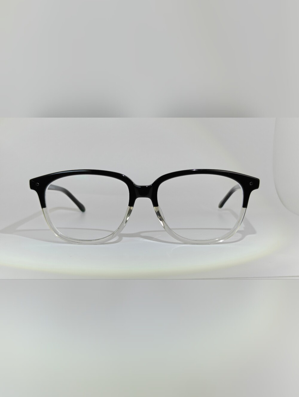 Escape.Classic Black to Clear Two-Tone Eyeglass Frames.